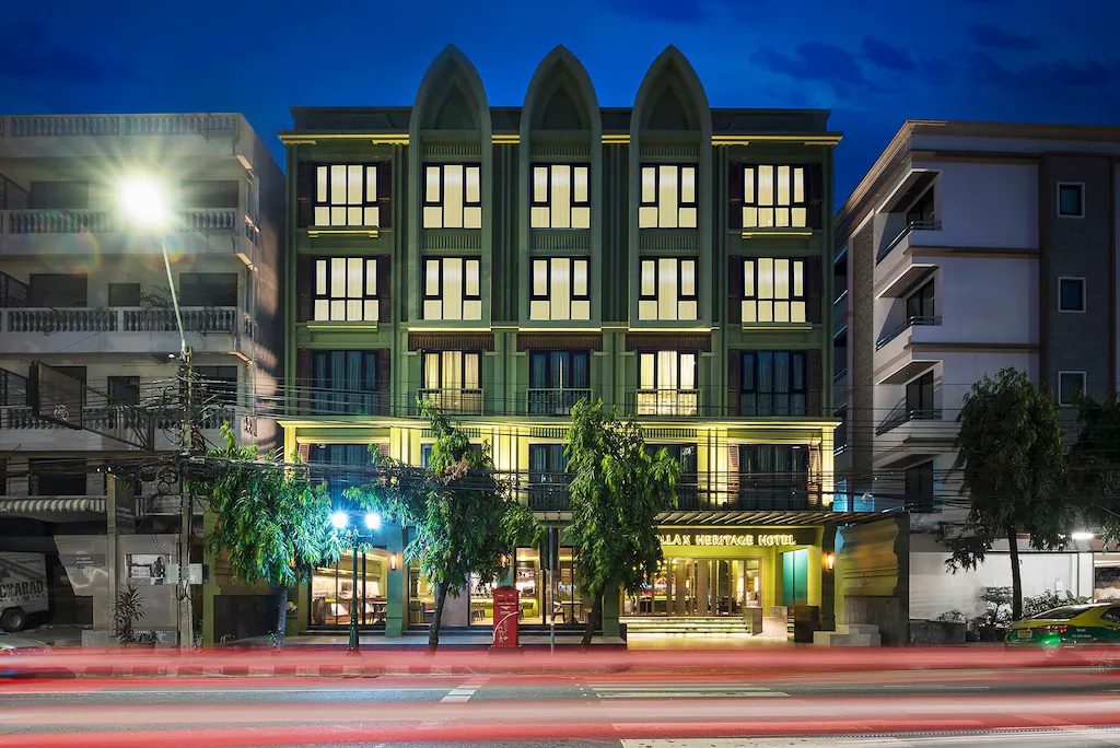 Illuminated exterior of Chillax Heritage Hotel at night