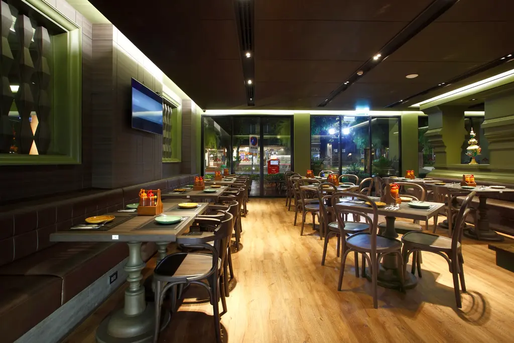 Dining tables and patterned details inside Srida Cuisine