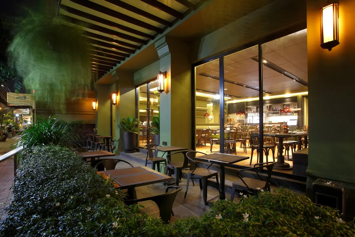 Garden-side tables outside Srida Cuisine